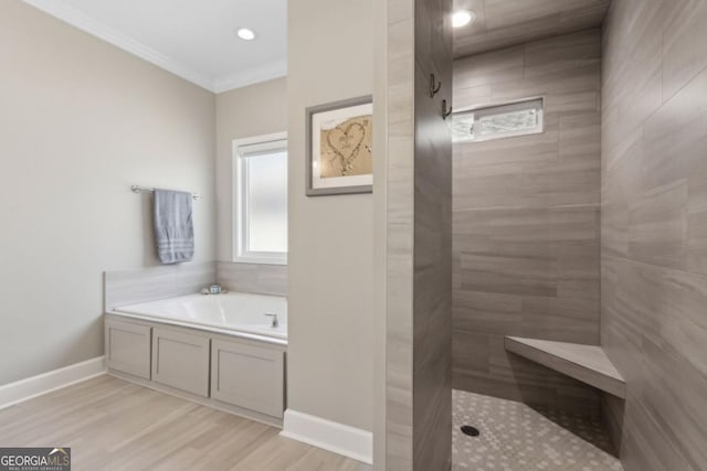 194 Pistachio Ln, Kingsland, GA 31548 - full bath with a garden tub, walk in shower, crown molding, a sauna / steam room, and wood finished floors