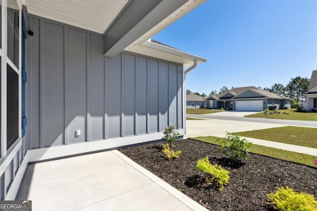 194 Pistachio Ln, Kingsland, GA 31548 - view of exterior entry featuring board and batten siding and a residential view