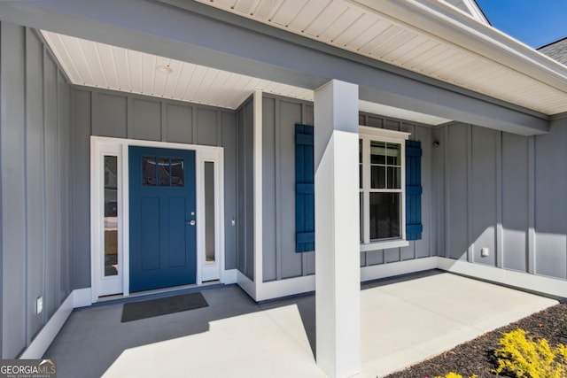 194 Pistachio Ln, Kingsland, GA 31548 - entrance to property with board and batten siding and a porch