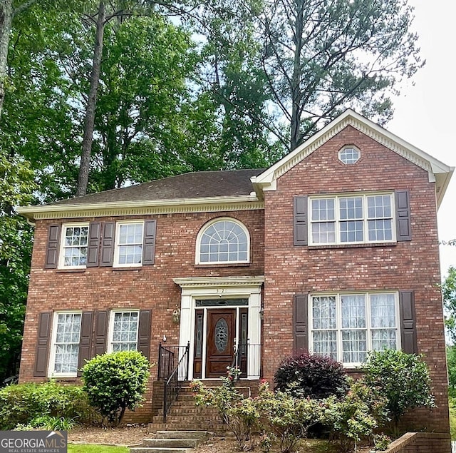 3120 Saint Andrews Cir, Duluth, GA 30096 - colonial house with brick siding and roof with shingles