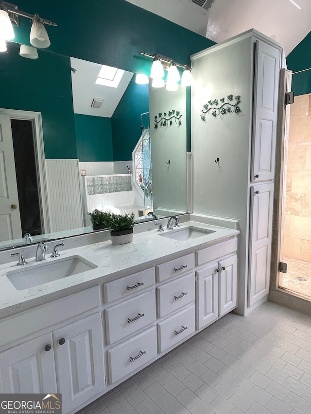 3120 Saint Andrews Cir, Duluth, GA 30096 - full bath featuring a skylight, double vanity, a stall shower, tile patterned flooring, and lofted ceiling