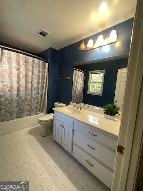 3120 Saint Andrews Cir, Duluth, GA 30096 - bathroom with vanity, toilet, tile patterned flooring, and shower / bathtub combination with curtain