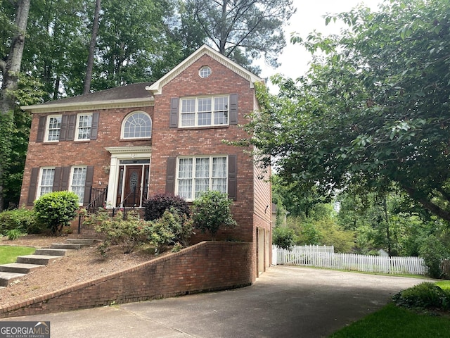 3120 Saint Andrews Cir, Duluth, GA 30096 - view of front of home with concrete driveway, brick siding, and a garage