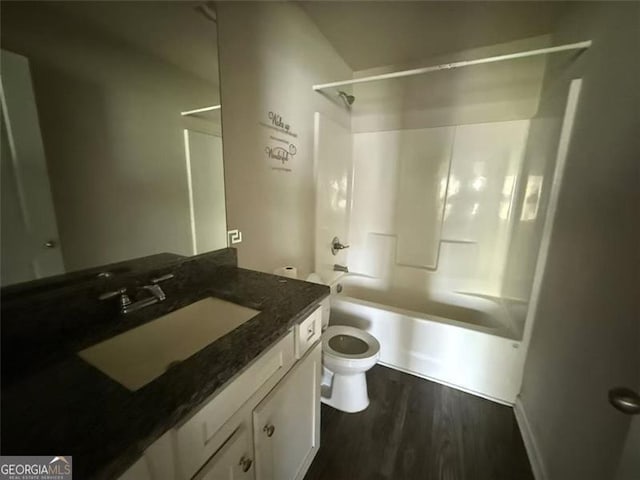 6446 Grey Fox Way, Riverdale, GA 30296 - full bathroom featuring toilet, vanity, bathing tub / shower combination, and wood finished floors