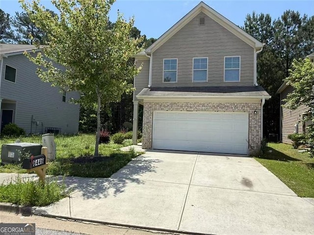 6446 Grey Fox Way, Riverdale, GA 30296 - view of front facade featuring brick siding, driveway, and an attached garage
