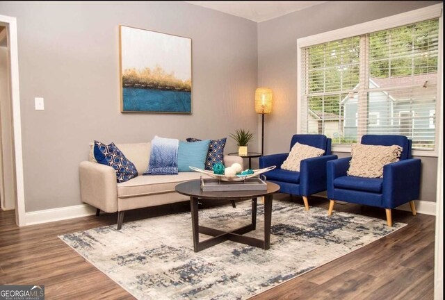 836 Wood St NW, Atlanta, GA 30318 - living area featuring baseboards and wood finished floors
