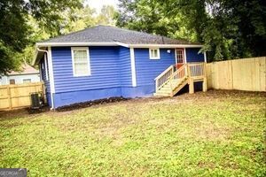 836 Wood St NW, Atlanta, GA 30318 - back of property with a fenced backyard