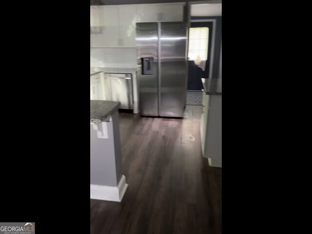 836 Wood St NW, Atlanta, GA 30318 - kitchen featuring stainless steel appliances, dark wood-style floors, and white cabinets