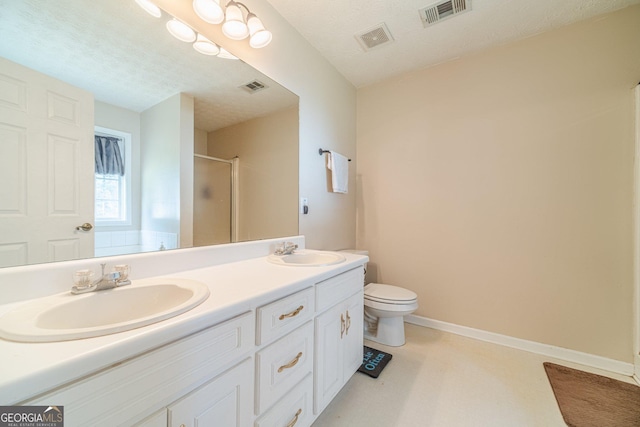 704 Stonecrest Ln, Loganville, GA 30052 - full bath featuring a shower with door, double vanity, toilet, and baseboards