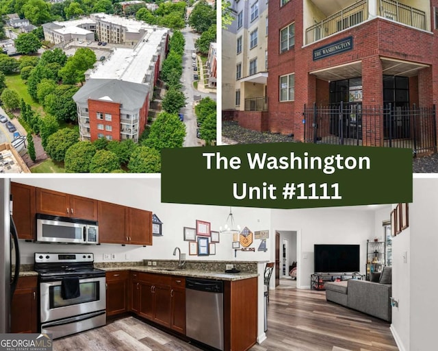 870 Mayson Turner Rd NW Unit 1111, Atlanta, GA 30314 - kitchen featuring stainless steel appliances, wood finished floors, a high ceiling, a sink, and light stone counters