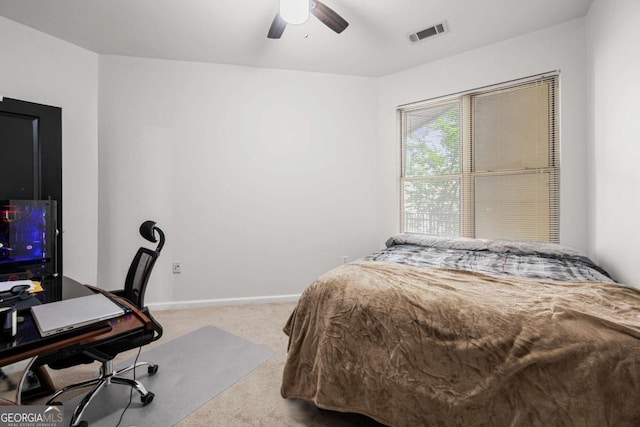 870 Mayson Turner Rd NW Unit 1111, Atlanta, GA 30314 - carpeted bedroom with baseboards, a ceiling fan, and a desk