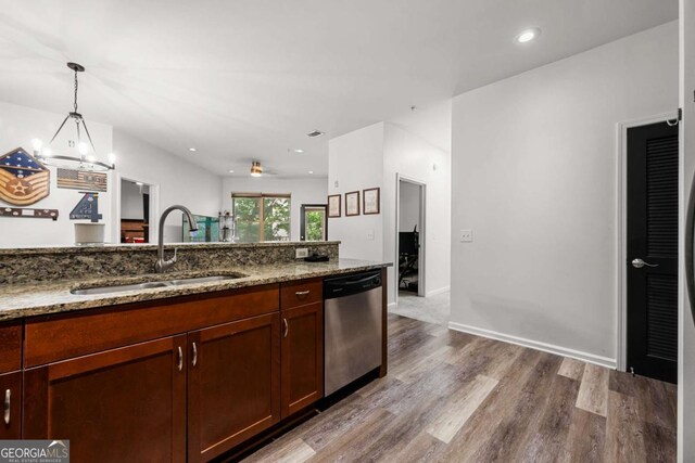 870 Mayson Turner Rd NW Unit 1111, Atlanta, GA 30314 - kitchen with dishwasher, a sink, wood finished floors, stone countertops, and decorative light fixtures