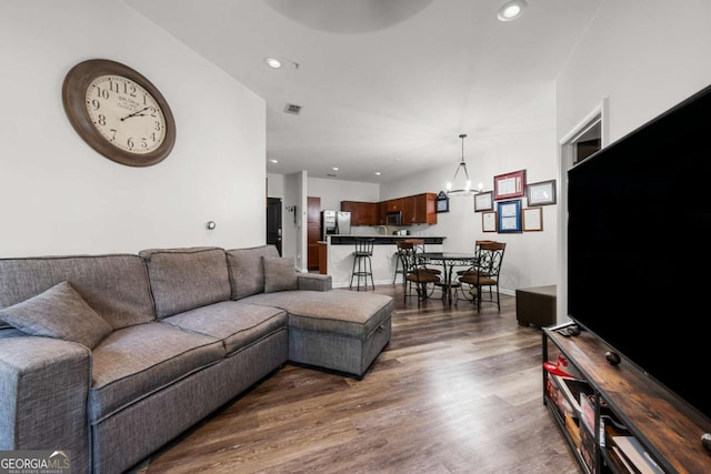 870 Mayson Turner Rd NW Unit 1111, Atlanta, GA 30314 - living area with wood finished floors, recessed lighting, and a chandelier