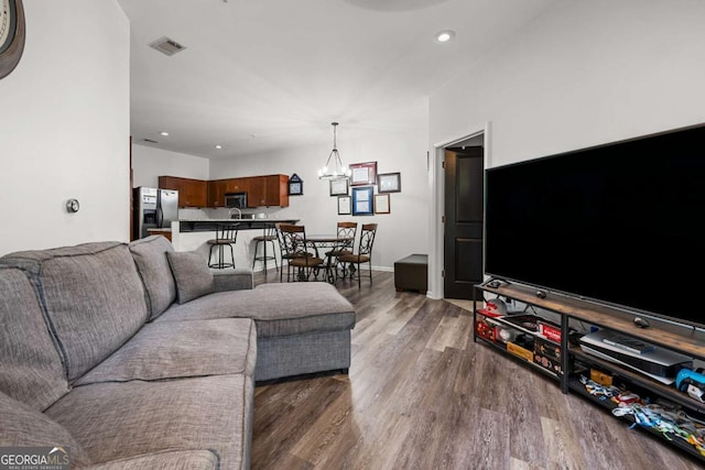 870 Mayson Turner Rd NW Unit 1111, Atlanta, GA 30314 - living area with wood finished floors, a chandelier, and recessed lighting