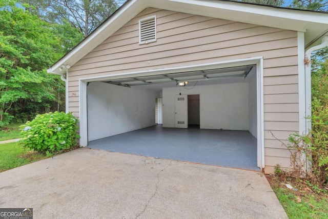 744 Martin Rd, Stone Mountain, GA 30088 - garage with a garage door opener