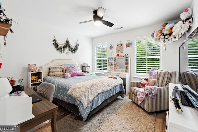 6565 Nix Rd, Dawsonville, GA 30534 - bedroom featuring light wood-style flooring and ceiling fan