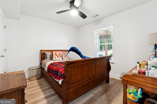 6565 Nix Rd, Dawsonville, GA 30534 - bedroom featuring wood finished floors, ceiling fan, and baseboards