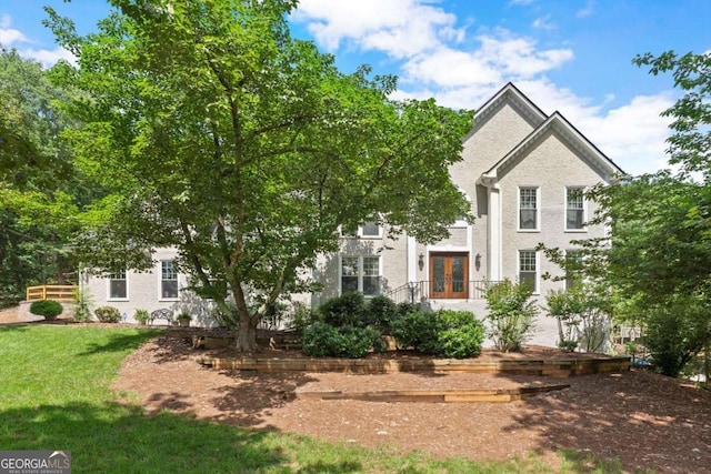 4223 N Mountain Rd NE, Marietta, GA 30066 - obstructed view of property featuring french doors and a front lawn