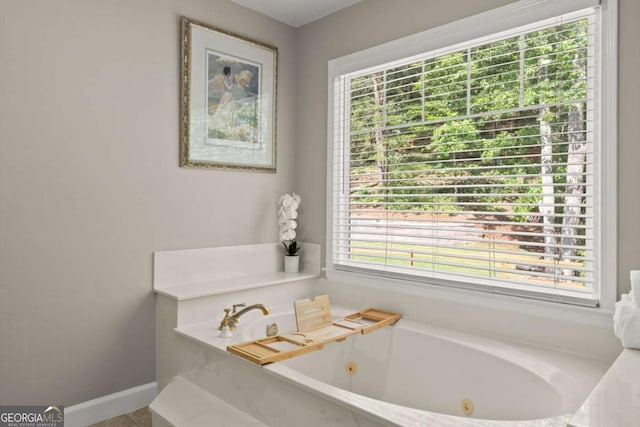 4223 N Mountain Rd NE, Marietta, GA 30066 - full bath featuring a tub with jets and baseboards