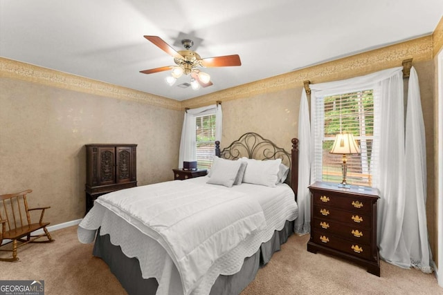 4223 N Mountain Rd NE, Marietta, GA 30066 - bedroom with light colored carpet and a ceiling fan