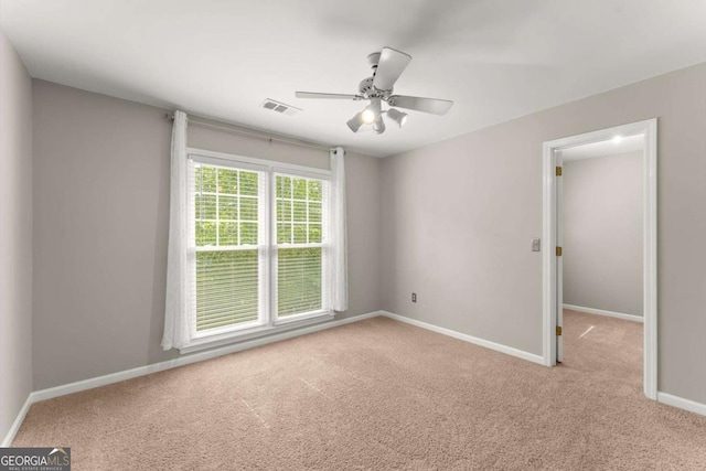 4223 N Mountain Rd NE, Marietta, GA 30066 - carpeted empty room featuring baseboards and a ceiling fan