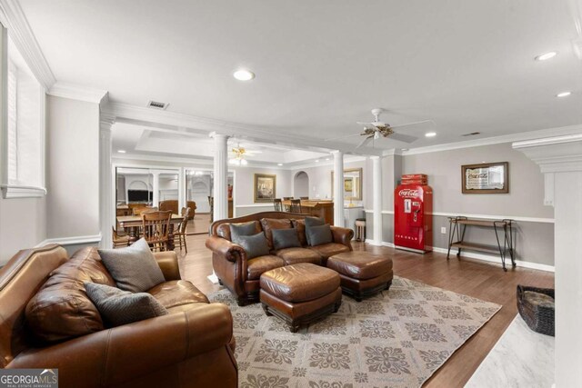 4223 N Mountain Rd NE, Marietta, GA 30066 - living area featuring decorative columns, ceiling fan, crown molding, wood finished floors, and recessed lighting