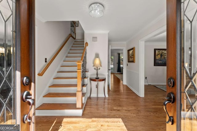 4223 N Mountain Rd NE, Marietta, GA 30066 - entrance foyer featuring stairs, wood finished floors, crown molding, and baseboards