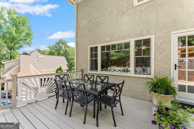 4223 N Mountain Rd NE, Marietta, GA 30066 - wooden deck featuring outdoor dining area