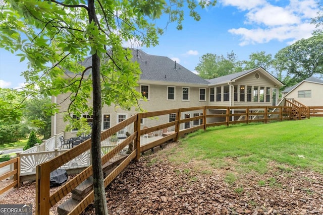 4223 N Mountain Rd NE, Marietta, GA 30066 - rear view of house featuring roof with shingles and stucco siding