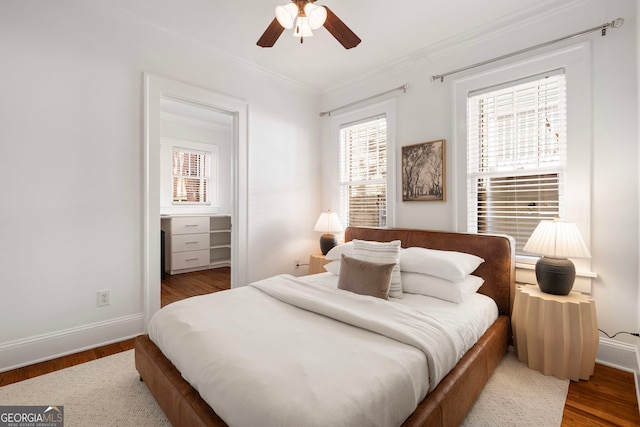 653 N Highland Ave NE Unit 5, Atlanta, GA 30306 - bedroom with wood finished floors, ornamental molding, and a ceiling fan