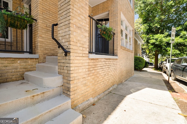 653 N Highland Ave NE Unit 5, Atlanta, GA 30306 - view of home's exterior with brick siding