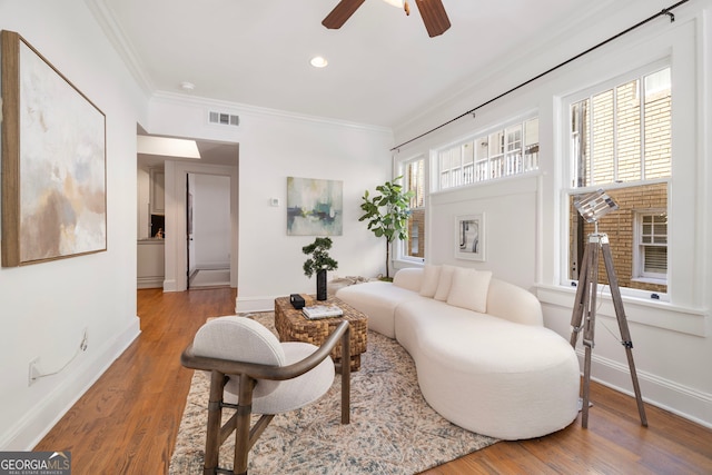 653 N Highland Ave NE Unit 5, Atlanta, GA 30306 - living area featuring a ceiling fan, crown molding, wood finished floors, and recessed lighting