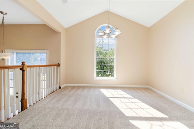 7186 Raintree Loop, Jonesboro, GA 30236 - carpeted spare room with a chandelier, lofted ceiling, and baseboards