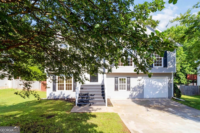 7186 Raintree Loop, Jonesboro, GA 30236 - view of front of house featuring a garage and driveway
