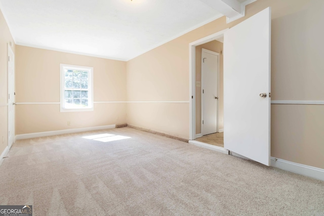 7186 Raintree Loop, Jonesboro, GA 30236 - unfurnished bedroom with carpet flooring, ornamental molding, and baseboards