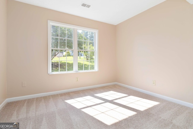 7186 Raintree Loop, Jonesboro, GA 30236 - carpeted empty room with baseboards