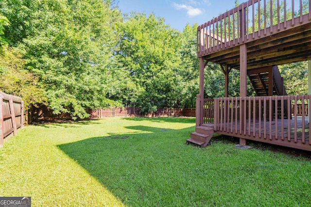 7186 Raintree Loop, Jonesboro, GA 30236 - view of yard with a wooden deck and stairway