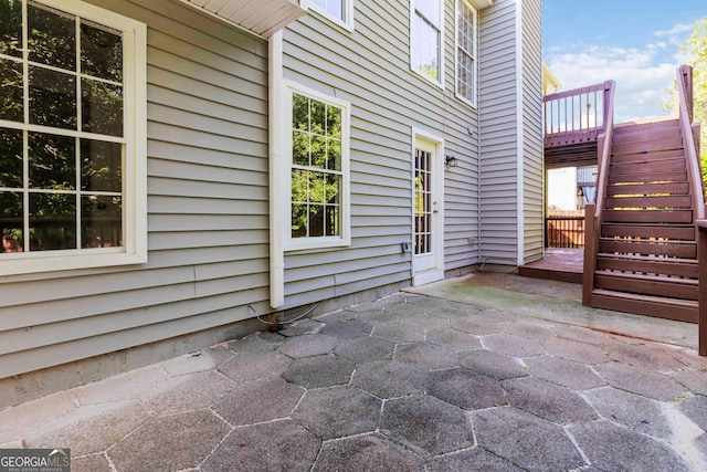 7186 Raintree Loop, Jonesboro, GA 30236 - view of patio / terrace featuring stairway and a deck