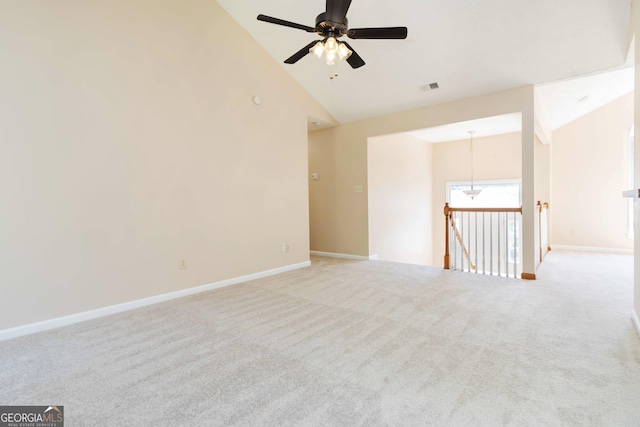 7186 Raintree Loop, Jonesboro, GA 30236 - carpeted spare room featuring a ceiling fan, baseboards, and high vaulted ceiling