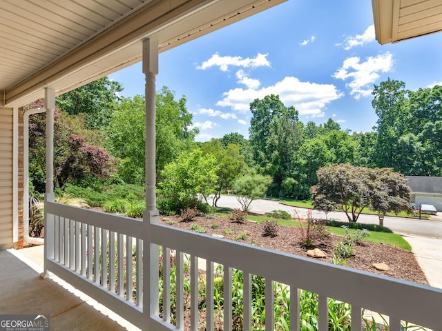264 Keller Dr, Mcdonough, GA 30252 - covered porch with view of scattered trees