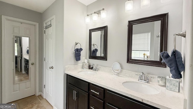 326 Daniel Trent Way, Kingsland, GA 31548 - bathroom featuring double vanity and tile patterned floors