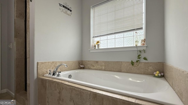 326 Daniel Trent Way, Kingsland, GA 31548 - full bathroom with a garden tub and a shower
