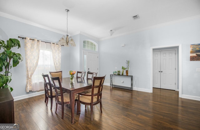 326 Daniel Trent Way, Kingsland, GA 31548 - dining space featuring a chandelier, crown molding, wood finished floors, and baseboards