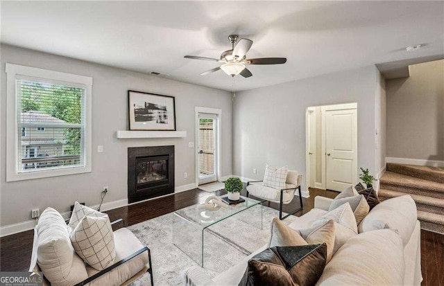 2817 White Oak Ln, Decatur, GA 30032 - living area featuring baseboards, a glass covered fireplace, ceiling fan, and dark wood-type flooring