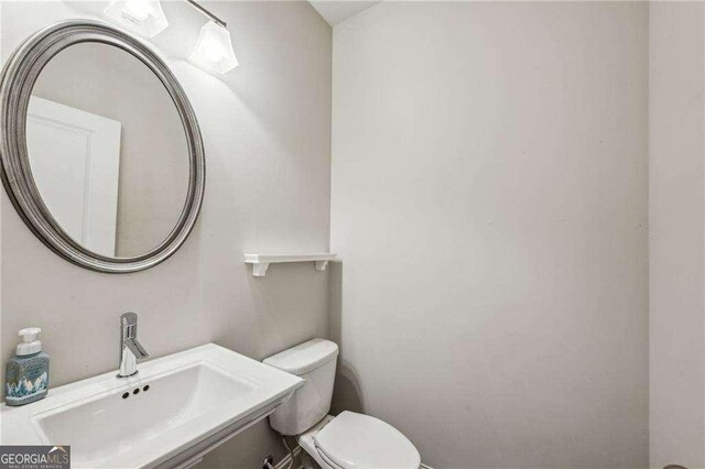 2817 White Oak Ln, Decatur, GA 30032 - bathroom featuring a sink and toilet