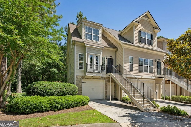 3150 Stonewyck Pl, Decatur, GA 30033 - view of front facade featuring an attached garage, stairs, driveway, and covered porch