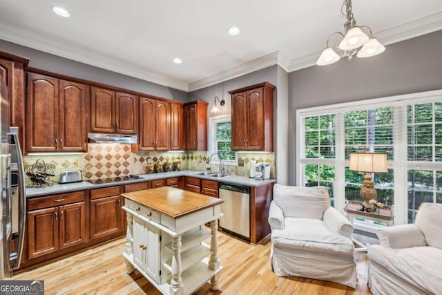 3150 Stonewyck Pl, Decatur, GA 30033 - kitchen featuring stainless steel dishwasher, under cabinet range hood, open floor plan, light wood finished floors, and recessed lighting