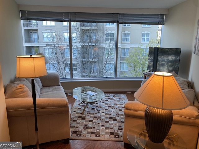 3338 Peachtree Rd NE Apt 505, Atlanta, GA 30326 - living area featuring wood finished floors and healthy amount of natural light