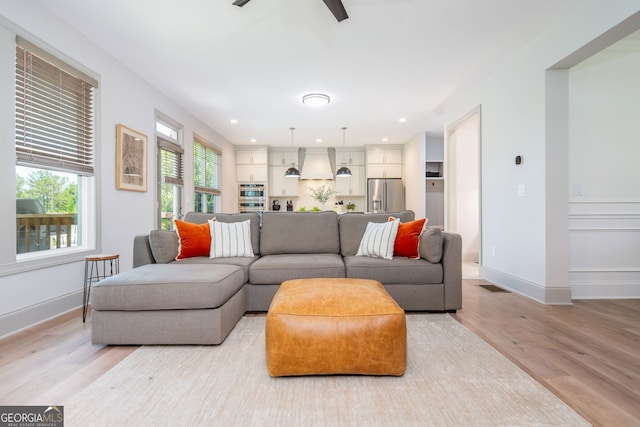 1013 Liberty Springs Dr, Woodstock, GA 30188 - living area with light wood-style floors, recessed lighting, and ceiling fan