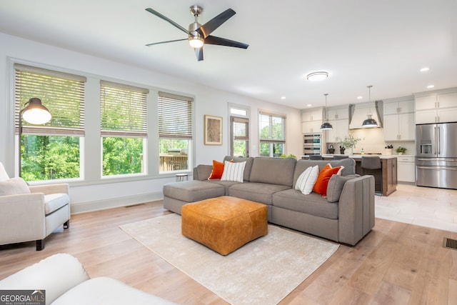 1013 Liberty Springs Dr, Woodstock, GA 30188 - living room with recessed lighting, ceiling fan, and light wood-style flooring